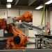 Industrial robotic arm in a Ciudad de México lab setting, showcasing automation technology.