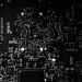 Detailed black and white photo of a circuit board showing intricate components, perfect for tech projects.