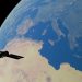 A satellite orbiting Earth, showcasing the Mediterranean Sea and surrounding continents.