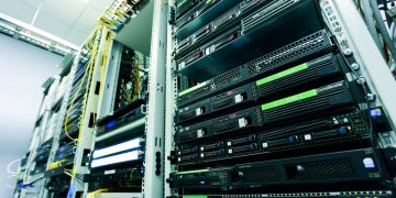 High-tech server rack in a secure data center with network cables and hardware c