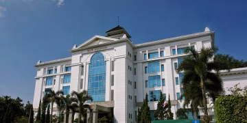 Impressive shot of the Bank Indonesia building in Bandung with vibrant blue skies.