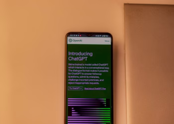 A smartphone showing the ChatGPT interface, emphasizing technology and AI indoors.