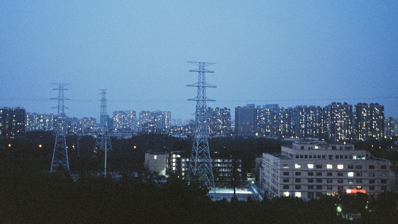 A view of a city at night from a distance
