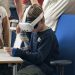 Visitor using a Meta Quest 3 VR headset at IPP Greifswald 2025