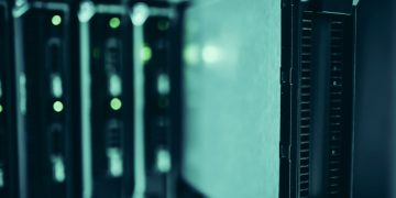 Close-up of server racks in a data center highlighting modern technology infrast