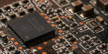 Detailed close-up of a computer circuit board showcasing electronic components.