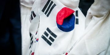 A detailed close-up of the wrinkled South Korean flag on fab