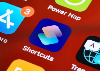 Detailed close-up of smartphone home screen displaying app icons like Shortcuts and Power Nap.