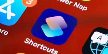 Detailed close-up of smartphone home screen displaying app icons like Shortcuts and Power Nap.