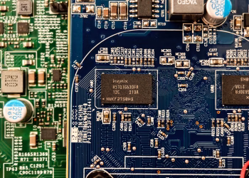 Detailed close-up of computer circuit boards highlighting electronic components and intricate circuitry.