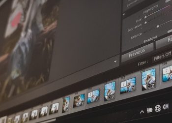 black laptop computer turned on displaying facebook