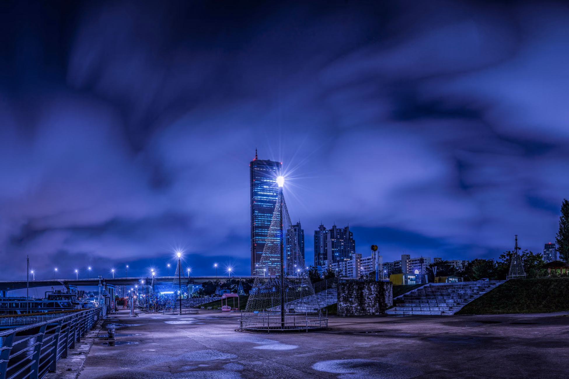 Stunning night view of Seoul's skyline with skyscrapers and illuminated architecture.