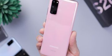 person holding rose gold iphone 6 s