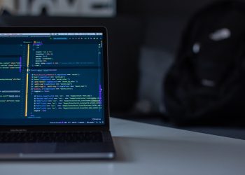 black laptop computer on white surface