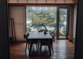 Elegant dining room with a view of a Japanese garden in Jeonju, South Korea.