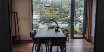 Elegant dining room with a view of a Japanese garden in Jeonju, South Korea.