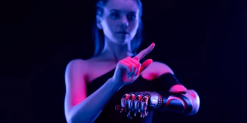 Conceptual photo of a woman using a prosthetic arm, showcasing cutting-edge biotechnology.
