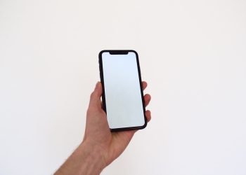 person holding black iphone 7