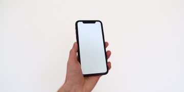 person holding black iphone 7