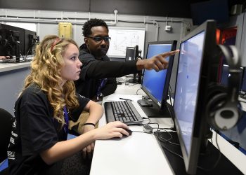 Sailor helps a high school student, complete cybersecurity challenges. (32378784741)