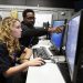 Sailor helps a high school student, complete cybersecurity challenges. (32378784741)