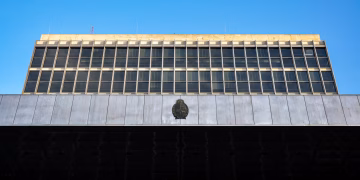 Urban architecture of a government building with a clear blue sky in Montevideo, Uruguay.