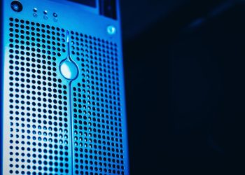 Modern server rack with blue lighting in a secure data center environment.