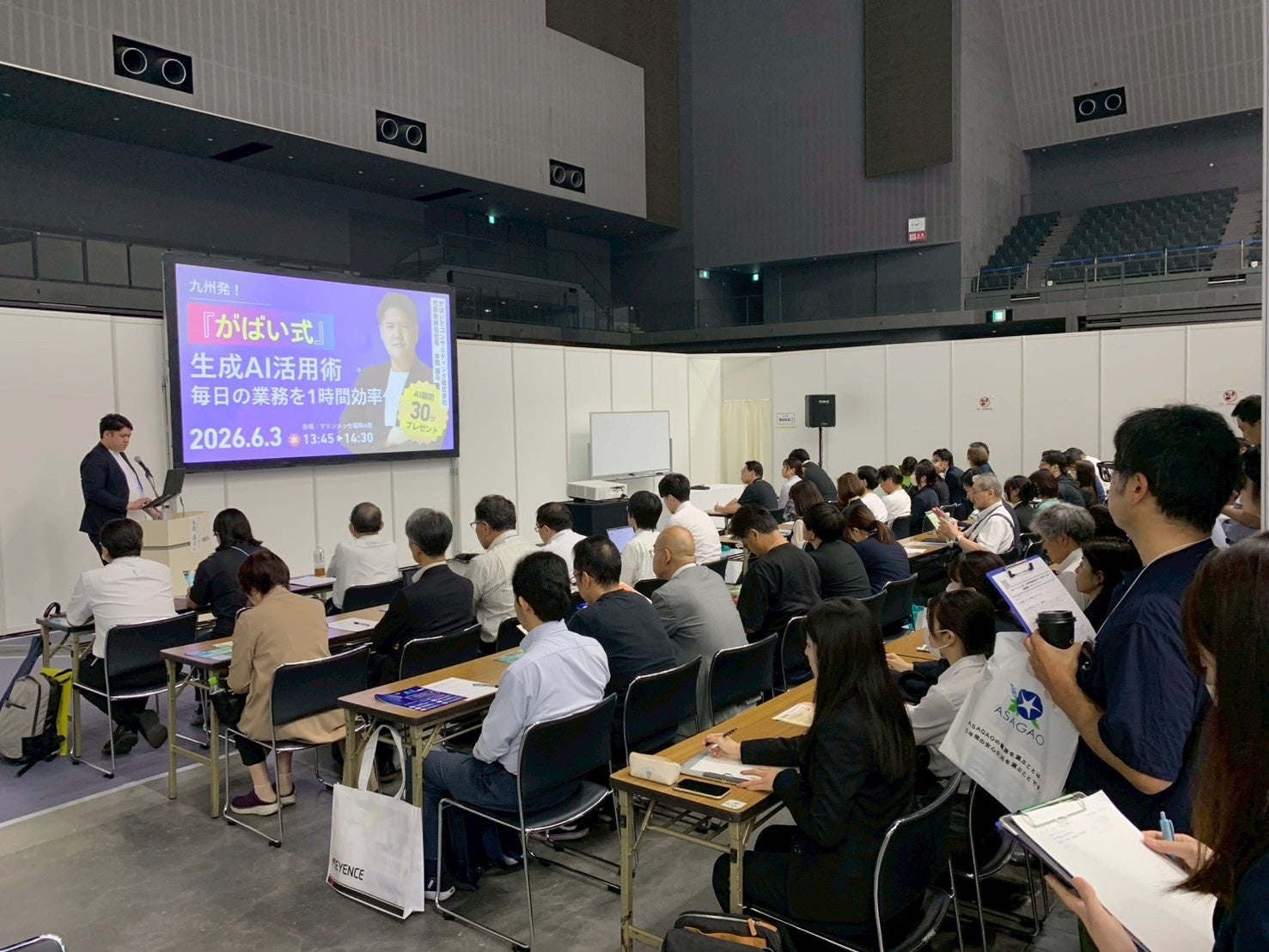 2026년 6월 3일 규슈 이노베이션 WEEK에서 혼마 겐토 대표가 생성형 AI 활용 세미나를 진행하는 모습